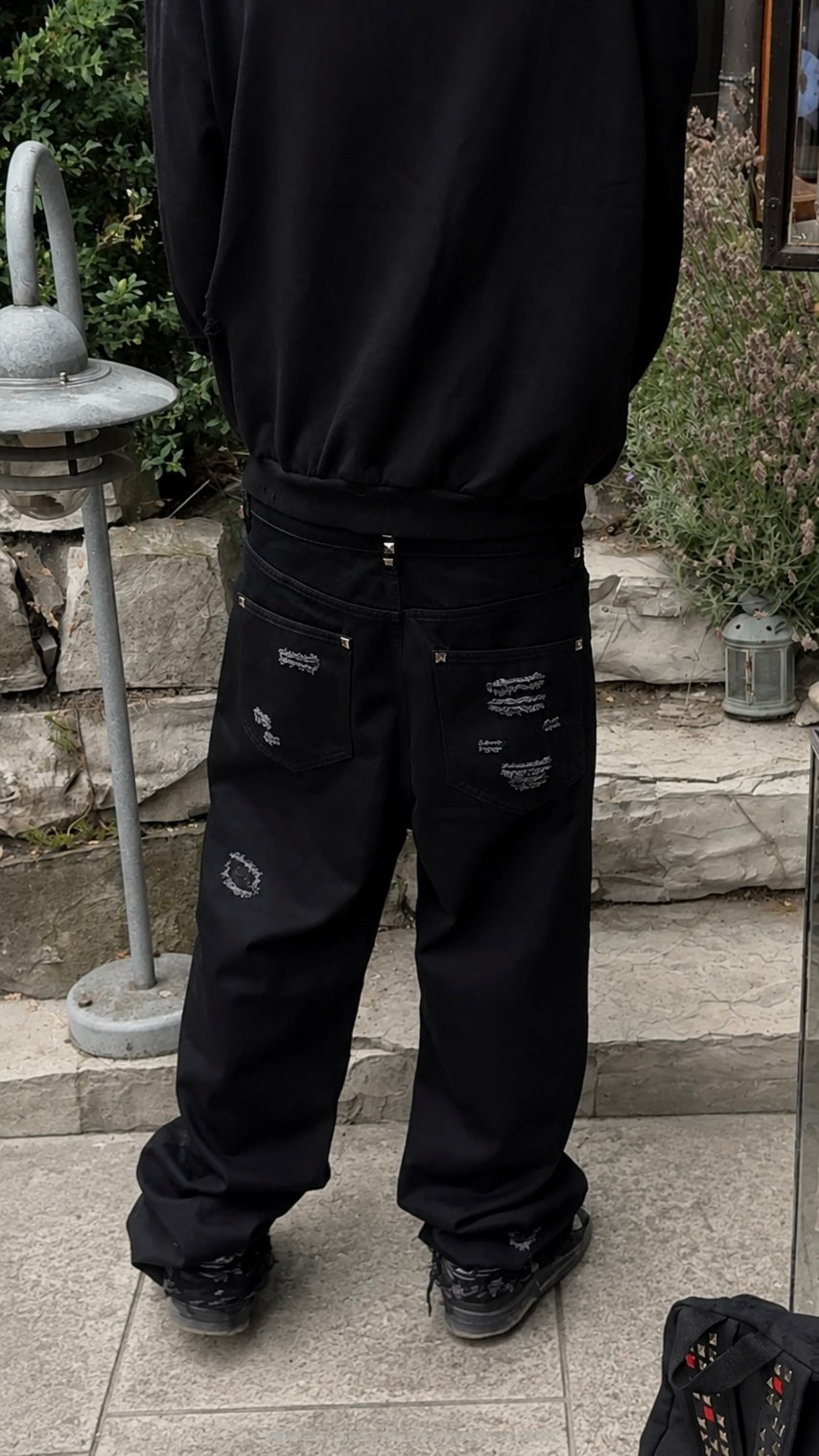 Healing wounds studded denim
