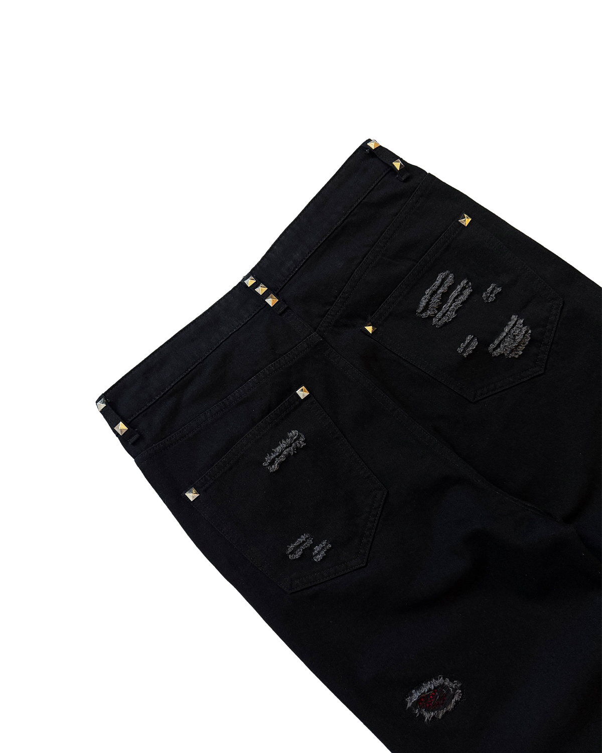 Healing wounds studded denim